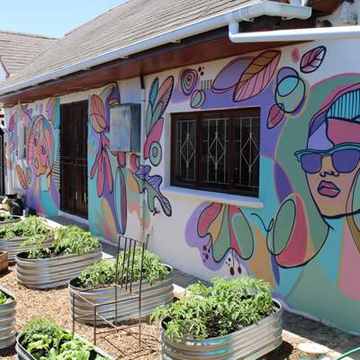 Help Community Women Action by doing artwork or graffiti  for the organization on an existing wall. 